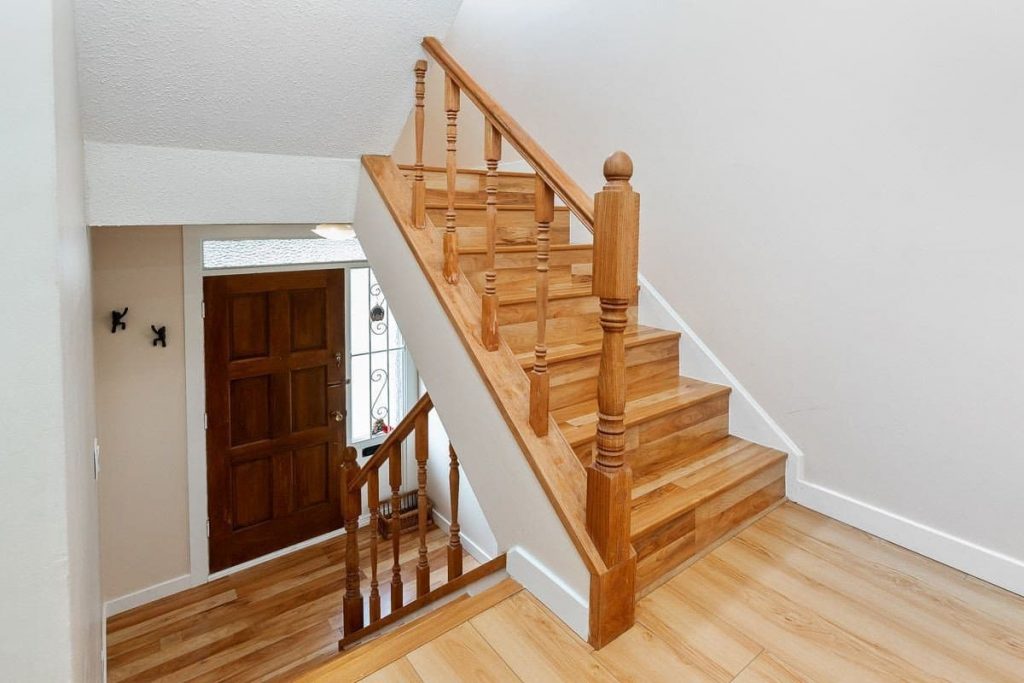 Modern staircase finish and wooden renovated door