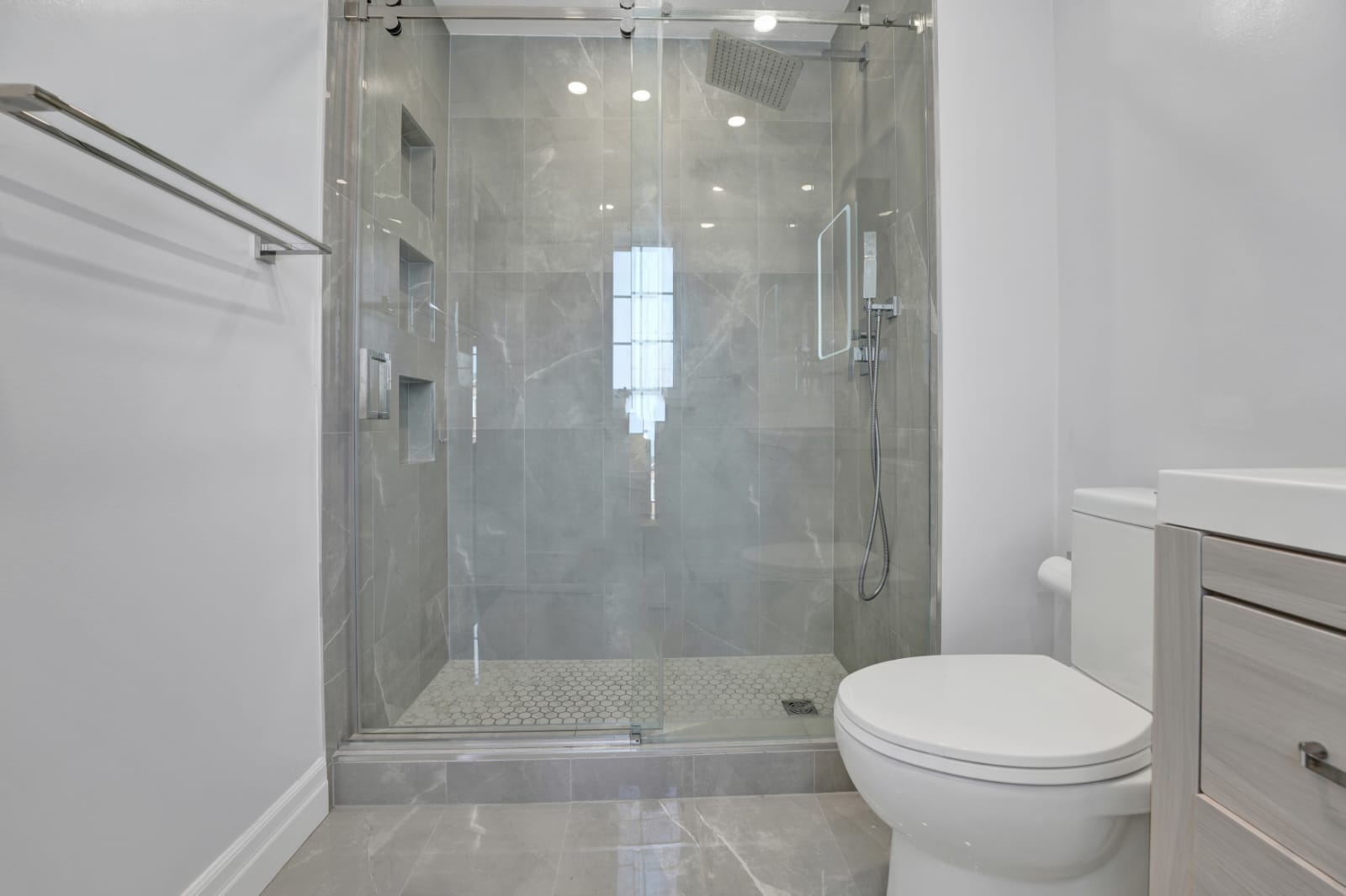 bathroom shower extension project in toronto done by luxe home renovations