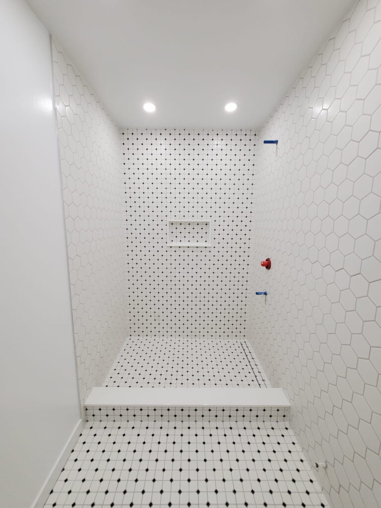 Mosaic bathroom tile installation