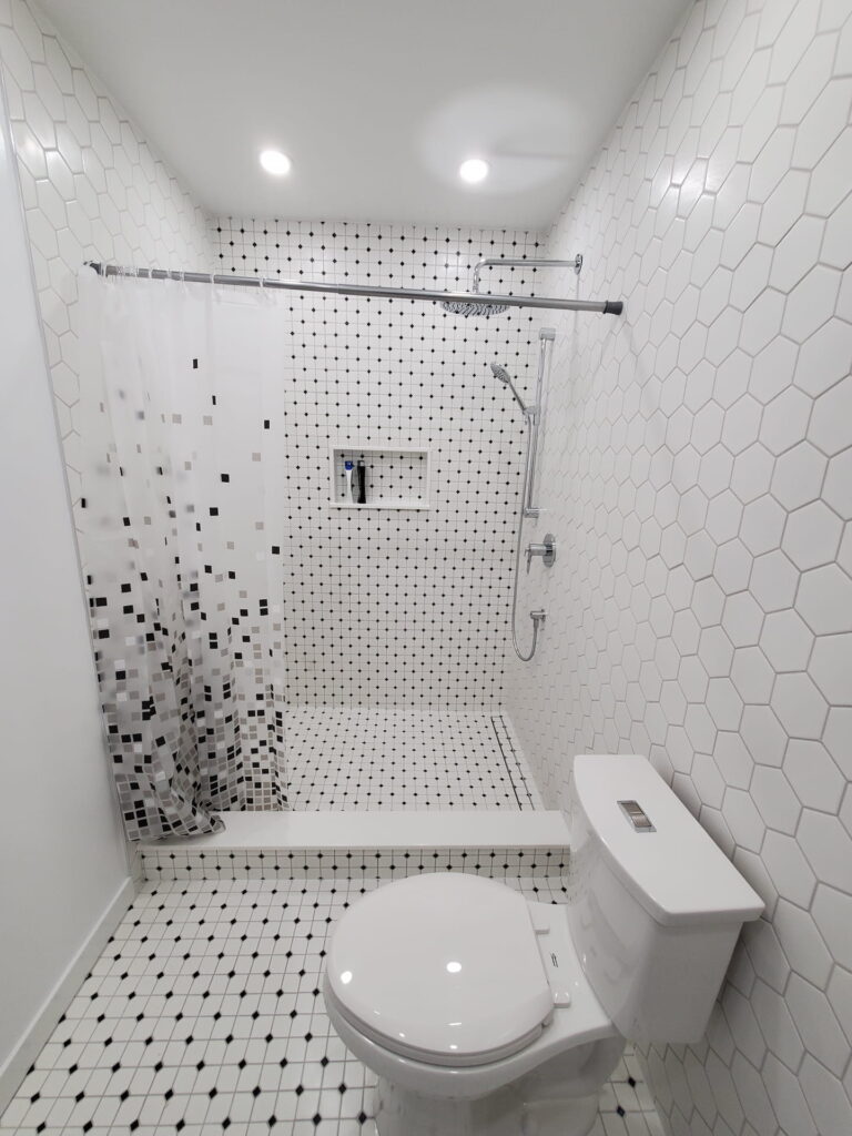 Mosaic bathroom tile installation after